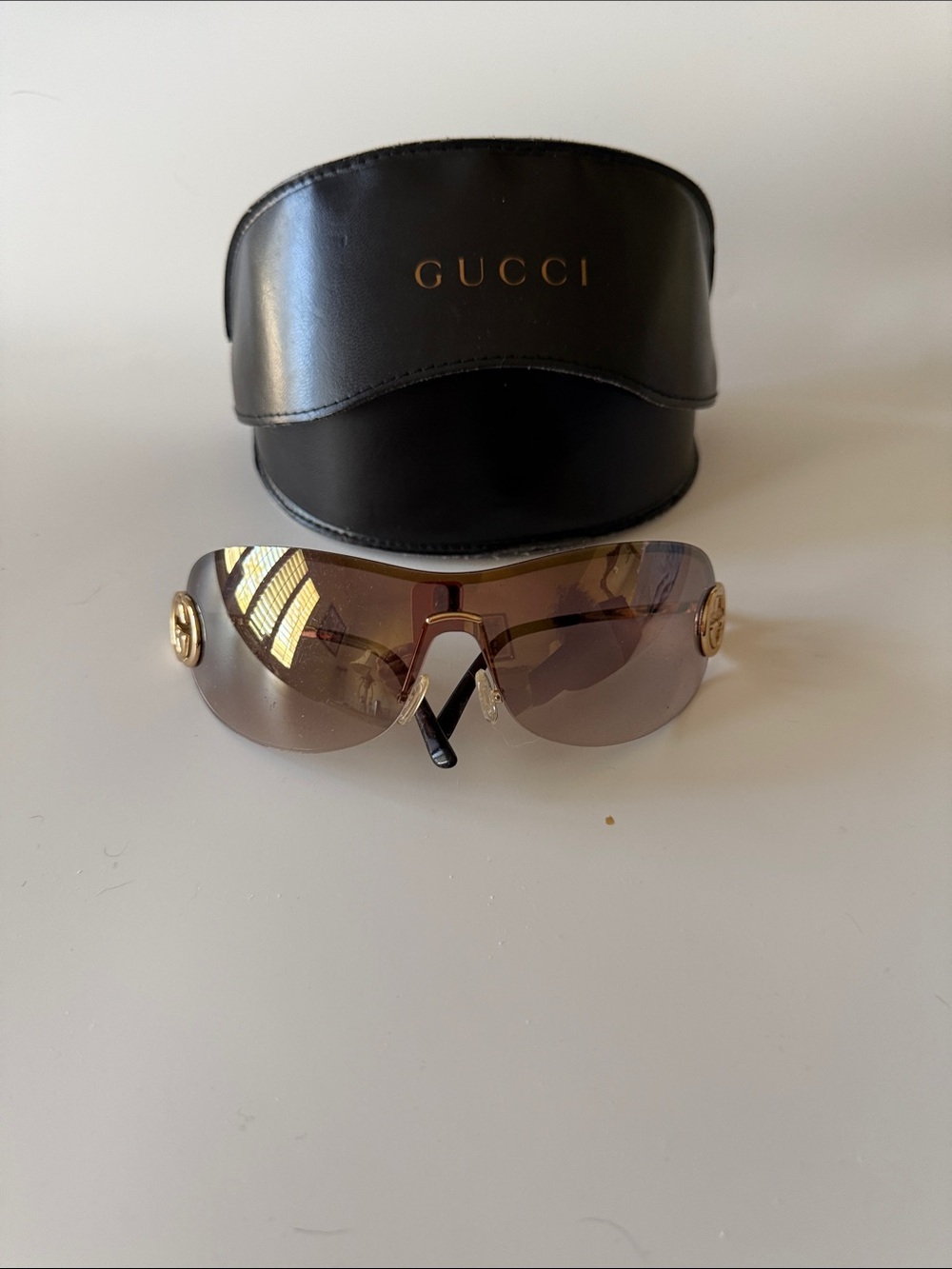 Gucci Rimless Shield Sunglasses in Brown and Gold